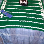 Award winning hand crocheted baby blanket with football