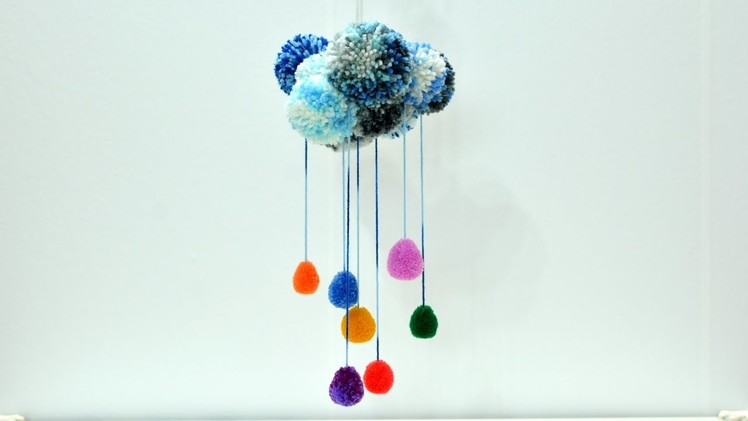 Pom Poms Rainbow Rain Cloud yarn wall decoration art craft diy tutorial kids play ideas fun carousel