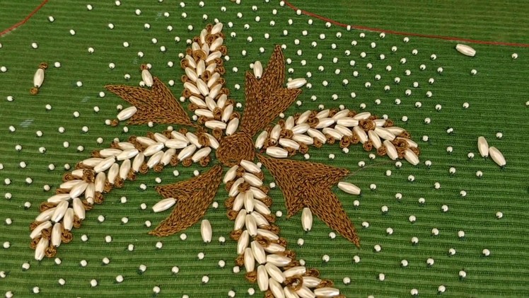 Beautiful design using rice pearl and thread embroidery