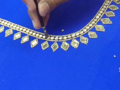 Fixing stones on a blouse back neck design