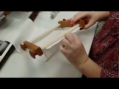 How to attach the tape for the EZ Needlework Scroll Frames to the fabric.