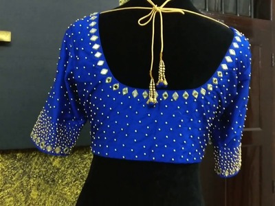 Thick beadwork blouse with mirror on neckline
