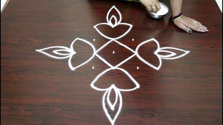 Easy rangoli designs for diwali with 7 to 1 dots- deepam kolam  designs - muggulu designs