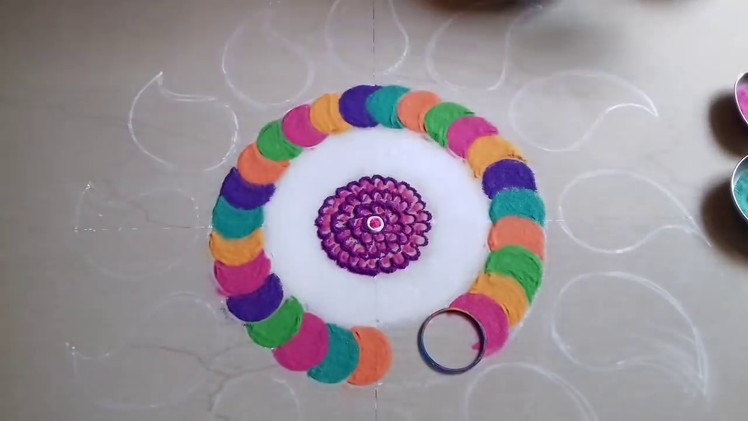 Rangoli designs with colours for festivals.muggulu designs