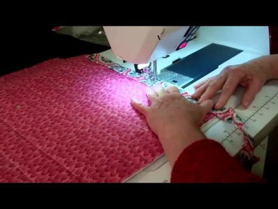 7.  Jelly Roll Race Quilt.  Binding the quilt,