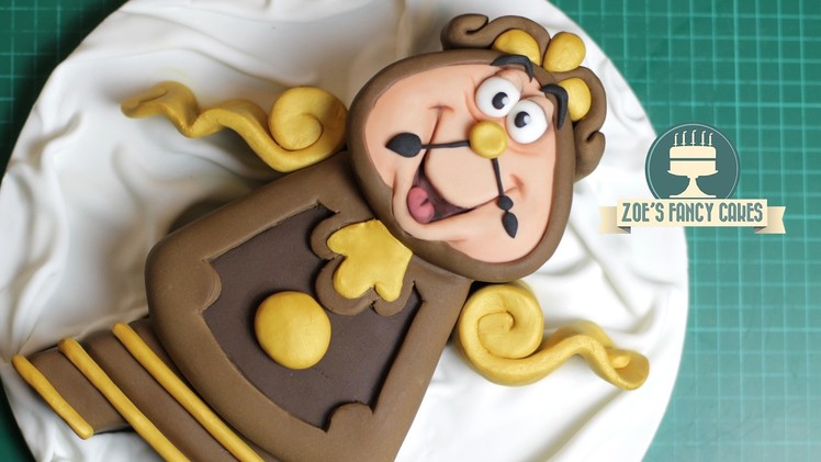 Cogsworth cake : Beauty and the Beast Disney cakes