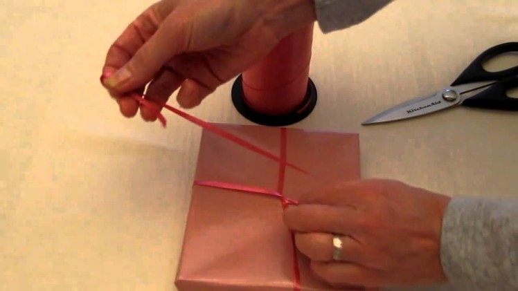 How To Tie A Ribbon On A Gift Part 1