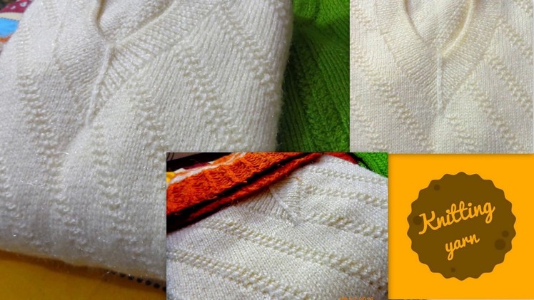 Cross pattern on cream color pullover (Hindi)