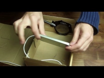 Glue a magnifying glass in a box and put your phone inside. That's simply amazing!