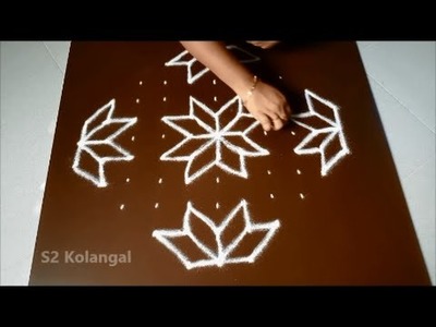 Simple kolam with 11 to 3 straight dots