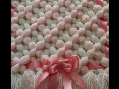 Pom pom blanket: Make a beautiful 3D Puffy flower design.