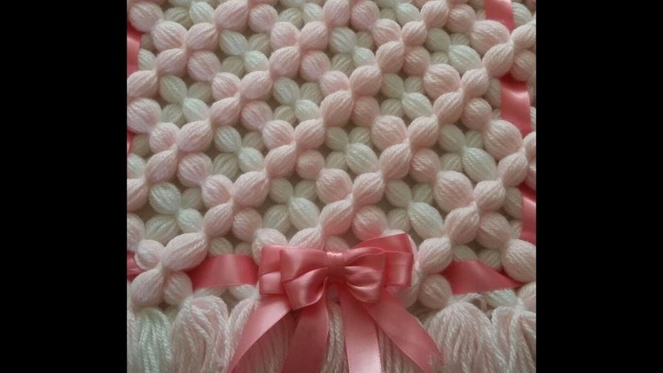 Pom pom blanket: Make a beautiful 3D Puffy flower design.
