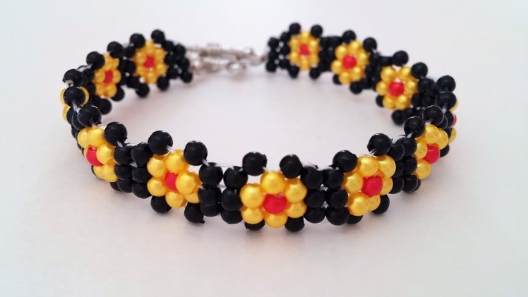 Make simple beaded flower bracelet. Bracelet design idea