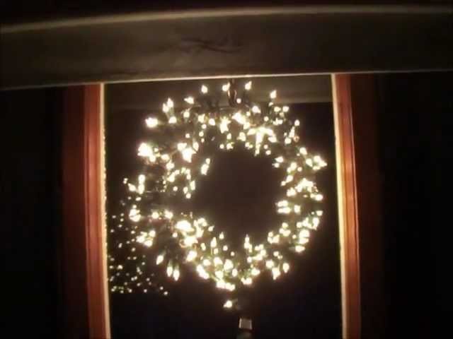 Reused items to make lighted Christmas window wreath.