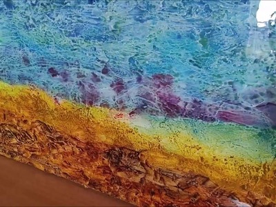 ArtResin applied to textured painting on canvas (no audio).