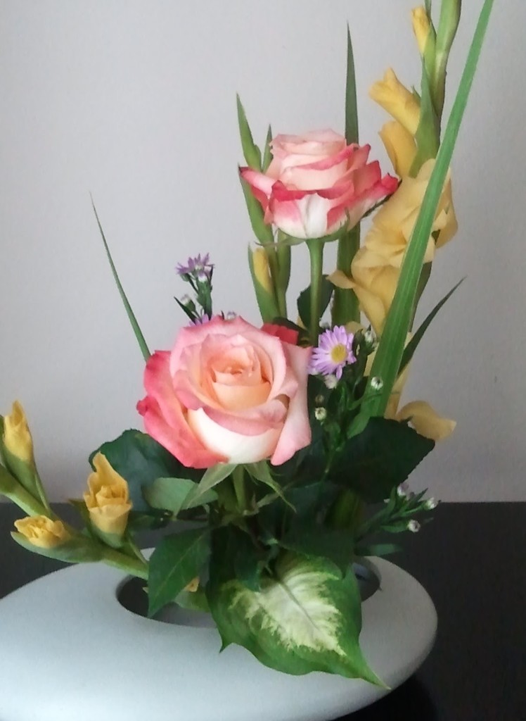 Why don't you try Ikebana; the Japanese art of arranging flowers?  Setp 1