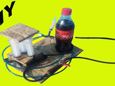 How to make a powerful hydraulic jack using Coca Cola and a syringe