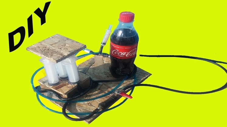How to make a powerful hydraulic jack using Coca Cola and a syringe