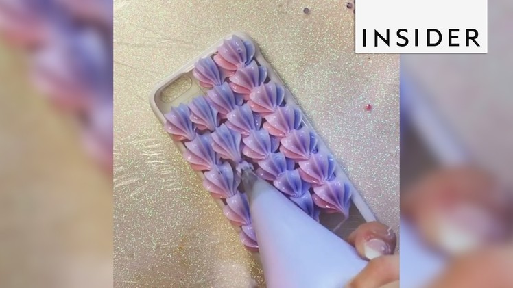 A cosplayer uses baking tools to create matching phone cases