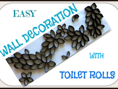 Homemade wall art made with toilet rolls. Reuse toilet rolls for home wall decoration.