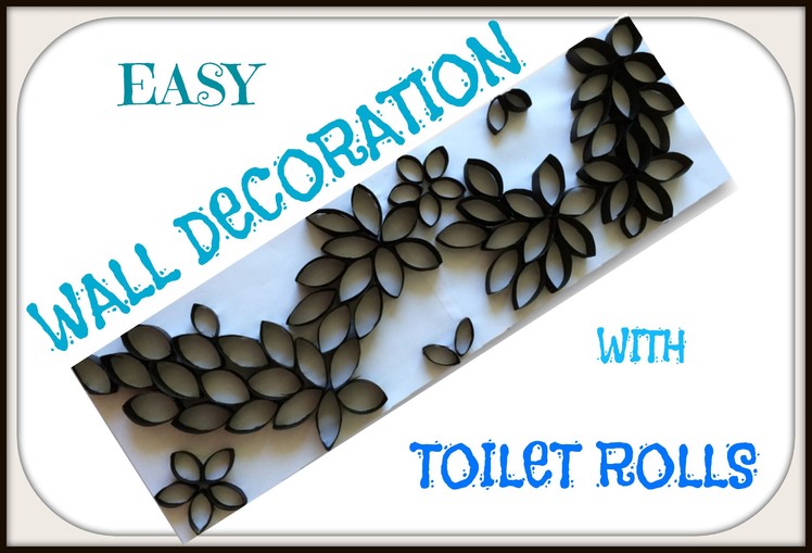 Homemade wall art made with toilet rolls. Reuse toilet rolls for home wall decoration.
