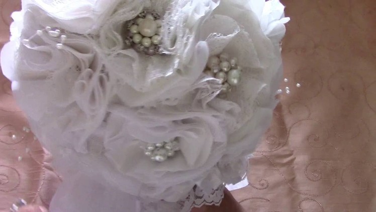 Bridal Bouquet. .handmade lace and fabric flowers and handmade brooches.