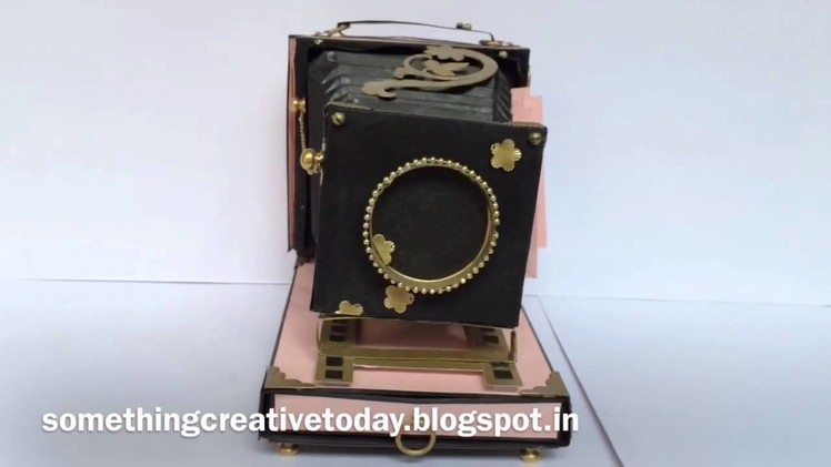 Vintage camera with banner style mini album and pullout tags