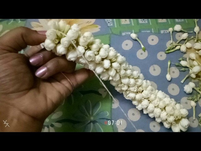 How to string Nandiavattam flower garland???