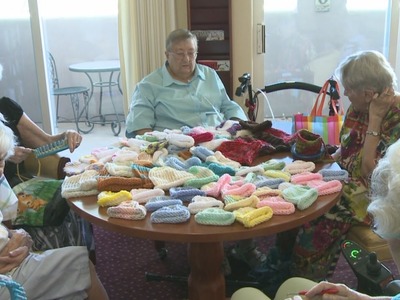 Elderly ladies knit for a good cause