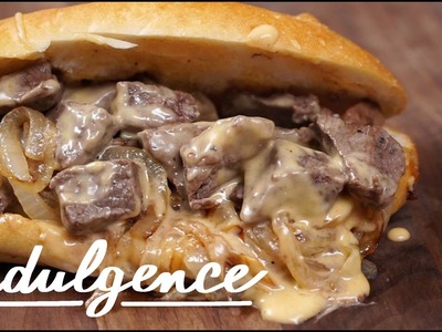 How to Make this Perfect Steak Sandwich With Cheese Sauce and Caramelized Onions