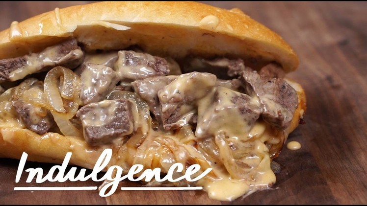 How to Make this Perfect Steak Sandwich With Cheese Sauce and Caramelized Onions
