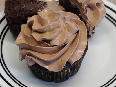 Chocolate Swiss Meringue Buttercream Frosting (on pudding filled chocolate cupcakes)