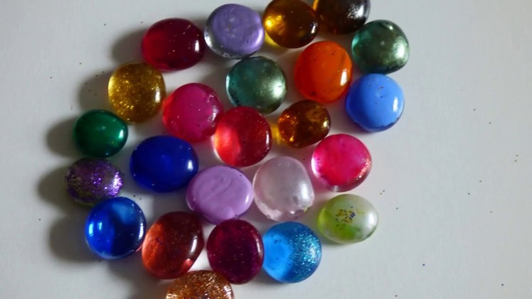 Pebble craft idea-How to paint glass pebbles with nail polish.