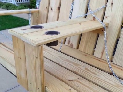 Porch swing with arm rest cup holder build.