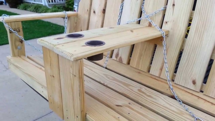 Porch swing with arm rest cup holder build.