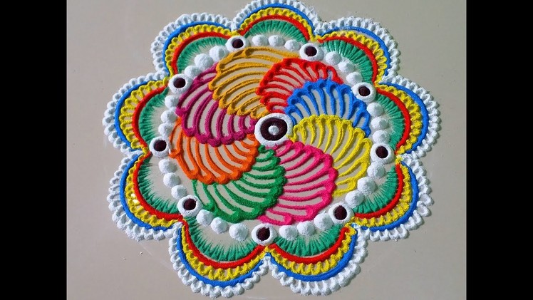 Beautiful innovative multicolor rangoli  design.by DEEPIKA PANT