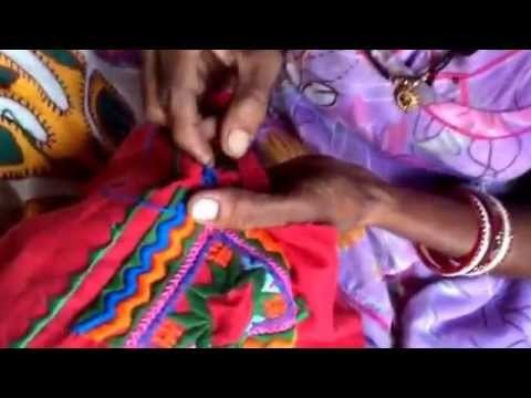 How to sew on a shisha mirror demonstrated here by Dhya in rural India.