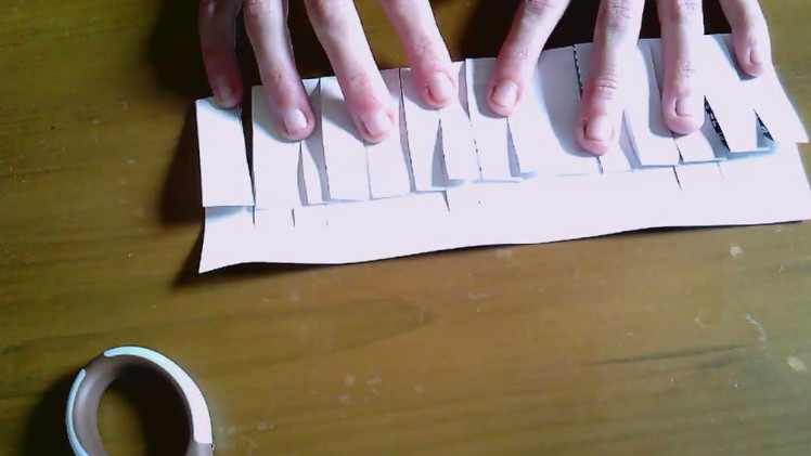 Cutting paper into a continuous strip