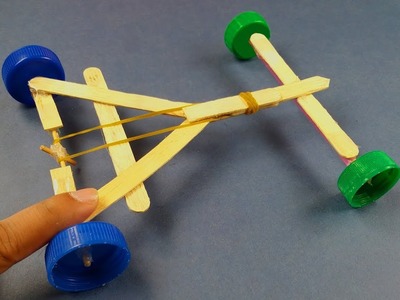 How to make a Rubber Band powered Car   DIY Rubber Band powered Car