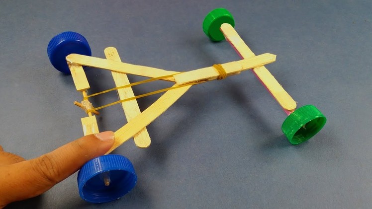 How to make a Rubber Band powered Car   DIY Rubber Band powered Car