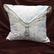 Beaded brocade cushion