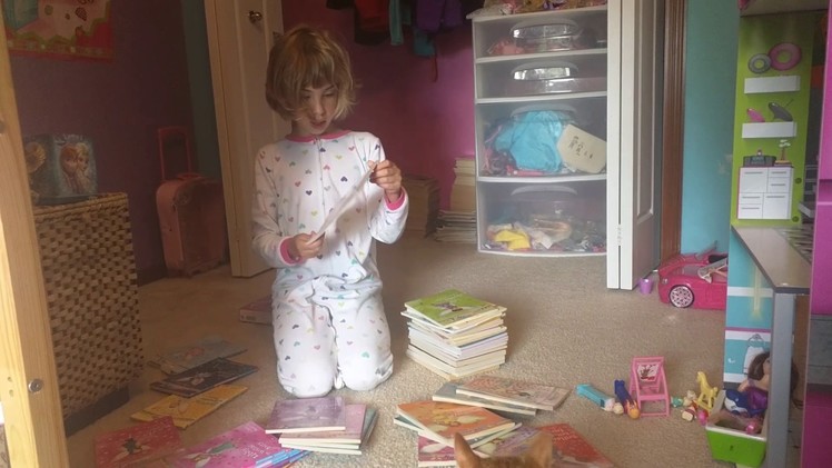 Olivia and her Rainbow Magic book collection!