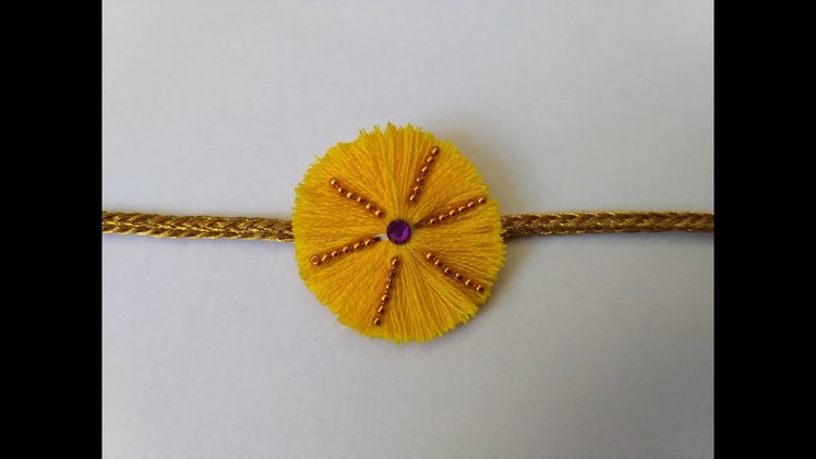 Silk thread handmade rakhi with gold ball chain