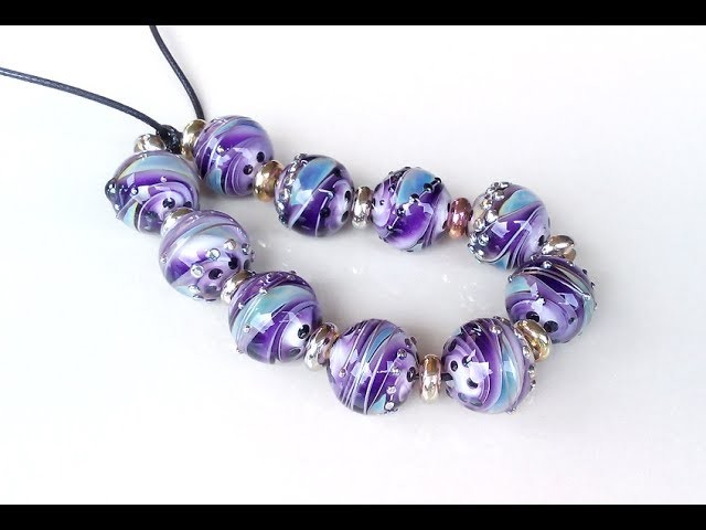 Swirl violet  lampwork glass beads 18 mm.