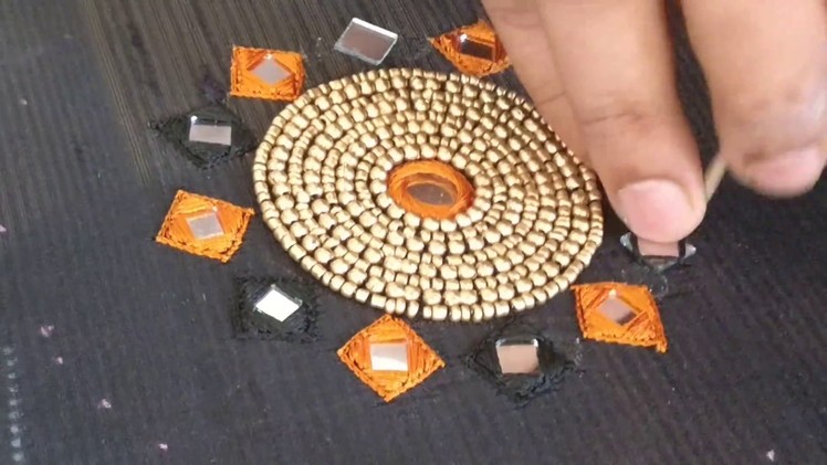 Unique chest piece design for a Kurthi top using beads and mirrors