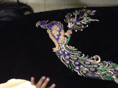 Beautifull Hand embroidered peacock  design on punjabi suit