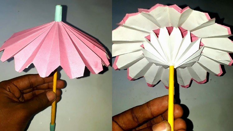 Umbrella craft. how to make paper umbrella.paper umbrella making that open and closed.