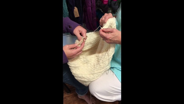 Knee To Knee. Four Handed Knitting