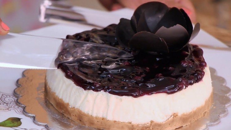 Learn how to make a simple delicious baked blueberry cheesecake using easily available ingredients