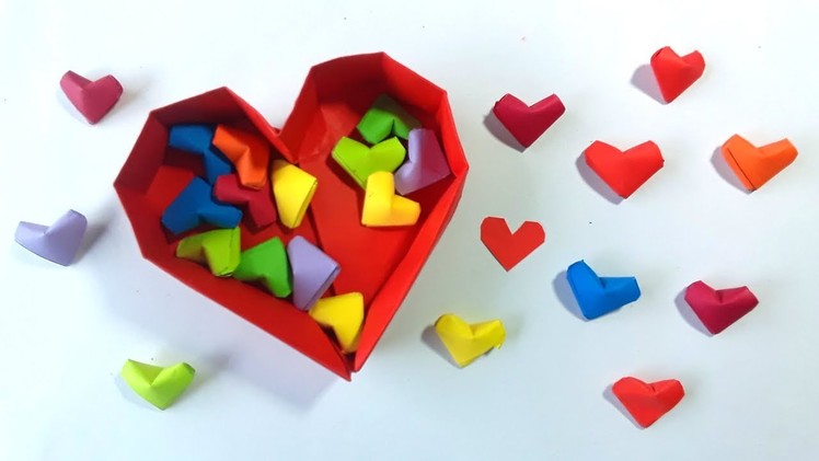 Como hacer corazoncitos de papel ¡facil origami! - How to Make Paper Hearts